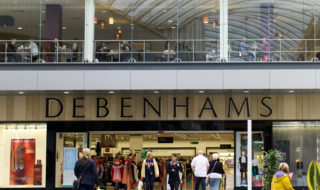 Debenhams slashes profit forecasts