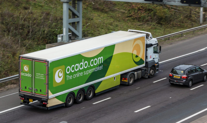 Ocado slips to loss but shares jump